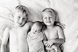 A newborn and his brothers