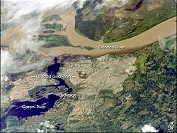 Orinoco at its confluence with the Caroní River (lower left)[18]