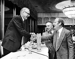 Maclyn McCarty (left) shakes hands with Francis Crick and James Watson, co-originators of the double-helix model based on the X-ray diffraction data and insights of Rosalind Franklin and Raymond Gosling.