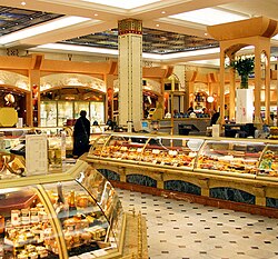 The retail servicescape includes the appearance, equipment, display space, retail counters, signage, layout and functionality of a retail outlet. Pictured: Harrods food court