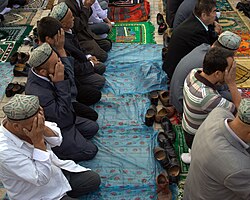 Muslim Uyghurs at prayer.