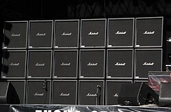 A 3 × 6 stack of mock Marshall guitar cabinets for Jeff Hanneman of Slayer.