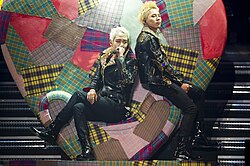 G-Dragon performing with T.O.P. in 2011
