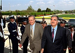 Hariri and Rumsfeld in 2002