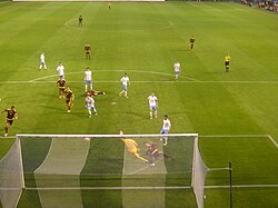 Match between Galicia (in white) and Venezuela (in burgundy).