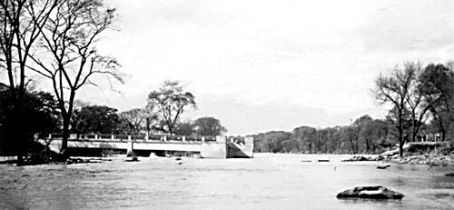 Not far upstream, the Lawrence Avenue bridge was washed away by the Humber River; part of it remained attached to the shore, while the rest was swept away by the river.