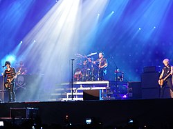 Green Day performing in 2013