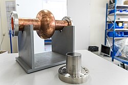 New superconducting radiofrequency (RF) cavities are developed to accelerate particles to higher energies.