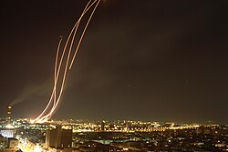 Patriot missiles being launched to intercept an Iraqi Scud missile during the Gulf War in 1991