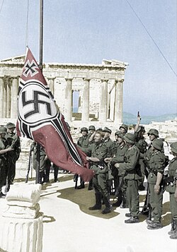 German soldiers preparing to raise the Reichkriegsflagge atop the Acropolis of Athens in May 1941