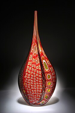 Glass sculpture by David Patchen from a show in San Francisco. The piece is 30" x 11" x 3" and comprises hundreds of murrine (patterned tiles of glass) and zanfirico cane (rods of woven colors).