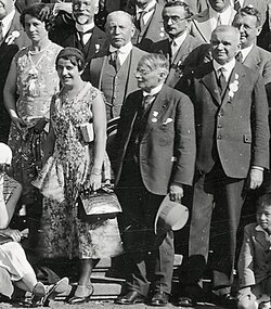 L to R: Dorothy Maud Wrinch, unknown woman in foreground), Élie Cartan (background, head truncated), Andrew Forsyth, Charles Jean de la Vallée Poussin (foreground, holding hat), Eugenio Giuseppe Togliatti (background),Rudolf Fueter, Hermann Weyl; background, partly obscured), at the 1932 International Congress of Mathematicians in Zürich