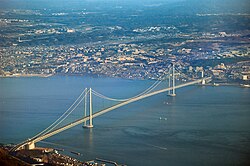 The Akashi Kaikyō Bridge extends from Kobe to Awaji Island.