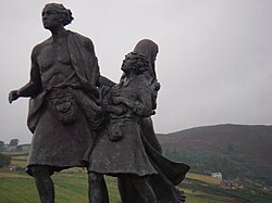 The emigrants statue commemorates the flight of Highlanders during the Clearances, but it is also a testament to their accomplishments in the places they settled. Located at the foot of the Highland Mountains in Helmsdale, Scotland.