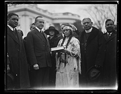 1923 photo of Calvin Coolidge with a Native American group at the White House