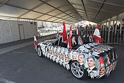A BMW with portraits of the late Prime Minister Hariri on March 26, 2005, shortly over month following his assassination
