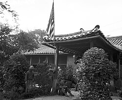 Raising the US flag at the US Embassy