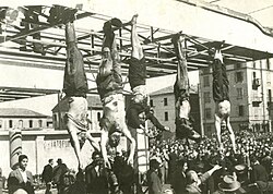 The dead bodies of Benito Mussolini, his mistress Clara Petacci, and several Fascist leaders, hanging for public display after they were executed by Italian partisans in 1945