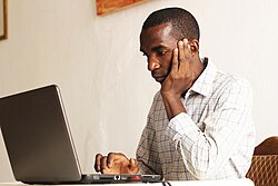 A person concentrating on their work