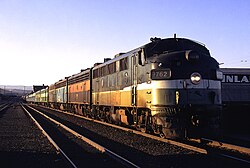 The North Coast Hiawatha near Yakima, Washington, in July 1971, an example of early Amtrak "rainbow" consists, made up of equipment still painted in the colors of various railroads