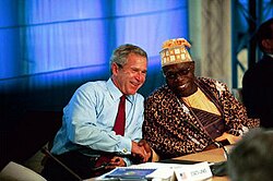 Bush talks with Obasanjo during a G8 Summit in France, June 2003