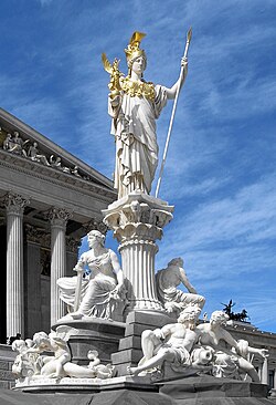 Statue of Athena, the patron goddess of Athens, in front of the Austrian Parliament Building. Athena has been used as an international symbol of freedom and democracy since at least the late eighteenth century.[65]