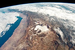 Satellite view of the Salar de Uyuni, located at the center of the image, captured from the International Space Station.