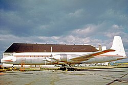 Canadair CC-106 of Societe Generale d'Alimentation (Zaire) at Montreal (Dorval) Airport in 1973 wearing remnants of its RCAF markings