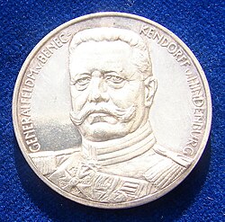 The face of a World War I German Silver medallion liberation of East Prussia 1914 by Paul von Beneckendorff und von Hindenburg.