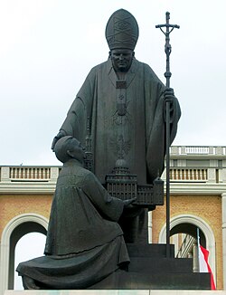 A monument depicting Pope John Paul II with priest Eugeniusz Makulski, which was removed in June 2019