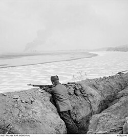 American sentry armed with a BAR overlooks the Han River