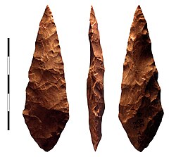 Bifacial silcrete point from M1 phase (71,000 BCE) layer of Blombos Cave, South Africa