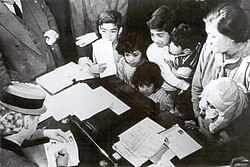 Perón meets with the public in her foundation's office.