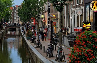 De Wallen, Amsterdam's red-light district, is internationally known and one of the main tourist attractions of the city. It offers legal prostitution and a number of coffee shops that sell marijuana.