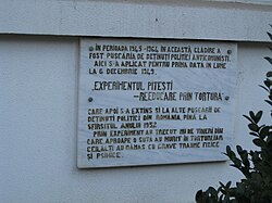 Memorial plaque at the prison entrance