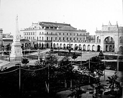 The first theatre (left), in front of Plaza de Mayo in 1881, photo by Alexander Witcomb