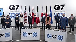Joly, then the minister for economic development, stands in the front row alongside other foreign and development ministers during the 47th G7 summit, December 2021