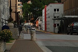 Fourth Street in downtown, looking east from the front of the Alaska State Capitol; the city's tallest building, Mendenhall Towers (12 stories tall),[63] is partially visible in the background.