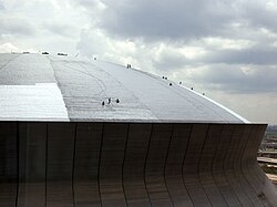 Contractors repair the roof to prepare for the reopening of the Superdome. (July 10, 2006)