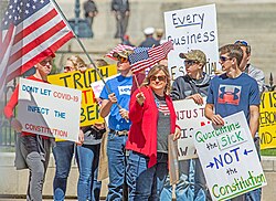 Anti-lockdown protesters rallied at the Ohio Statehouse 20 April 2020.[525]