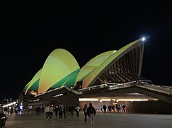 The Sydney Opera House, a national symbol, lit up in green and gold, the national colours, in 2023.