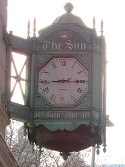 The clock of the "Sun Building" on Broadway, Manhattan, near Chambers Streets