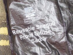 Rubbish bag designed to resist scavenging behaviour
