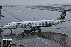 Frontier Airlines Embraer E190 operated by Republic Airways seen in 2013. This aircraft was later involved in an accident with another airline in 2018.