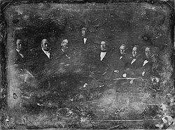 The Zachary Taylor Administration, 1849 Daguerreotype by Matthew BradyFrom left to right: William B. Preston, Thomas Ewing, John M. Clayton, Zachary Taylor, William M. Meredith, George W. Crawford, Jacob Collamer and Reverdy Johnson, (1849).