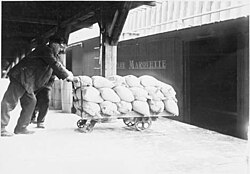 Loading salt into a Pere Marquette boxcar