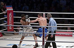 Boxer (left) using a high guard