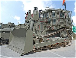 The IDF Caterpillar D9 armored bulldozer is used for a variety of combat engineering tasks, including opening routes, demolishing structures, digging antivehicular ditches, and constructing vehicle fighting positions.