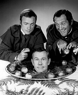 Carson with Dick Cavett and Alan King in a publicity photo promoting the 1968 California Friars Club roast of Carson.