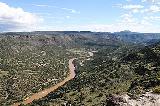 The Rio Grande, flowing down through the Rio Grande Rift for the last several million years. The last stage of incision by the river is thought to be driven by the Milankovitch eccentricity cycle. Increased precipitation and sediment supply drove incision of the high standing terraces, beginning at ~800ka.[12]